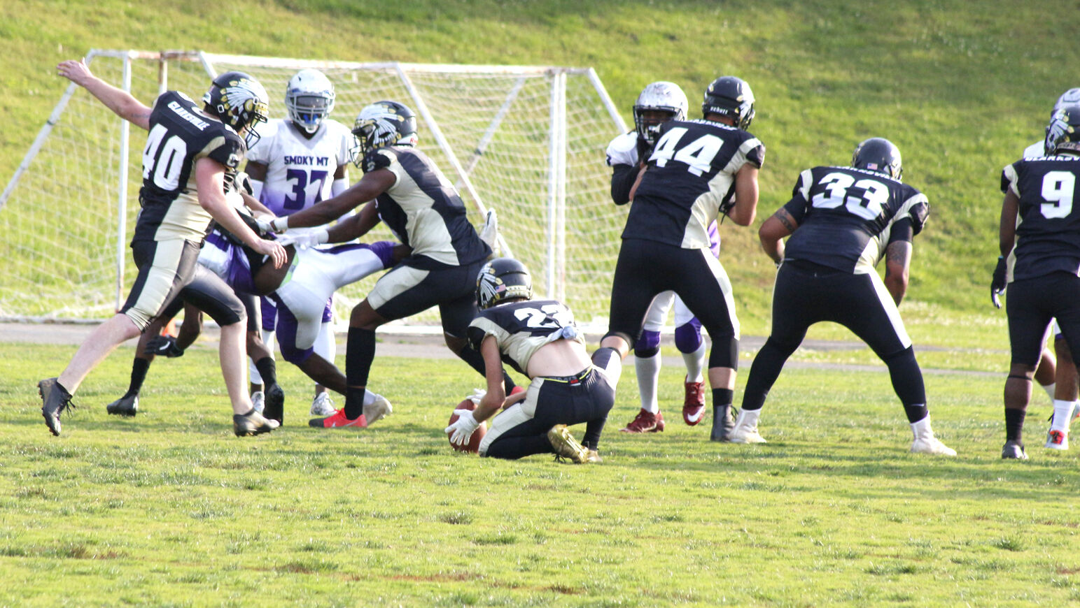 Ainley moves in for the kick